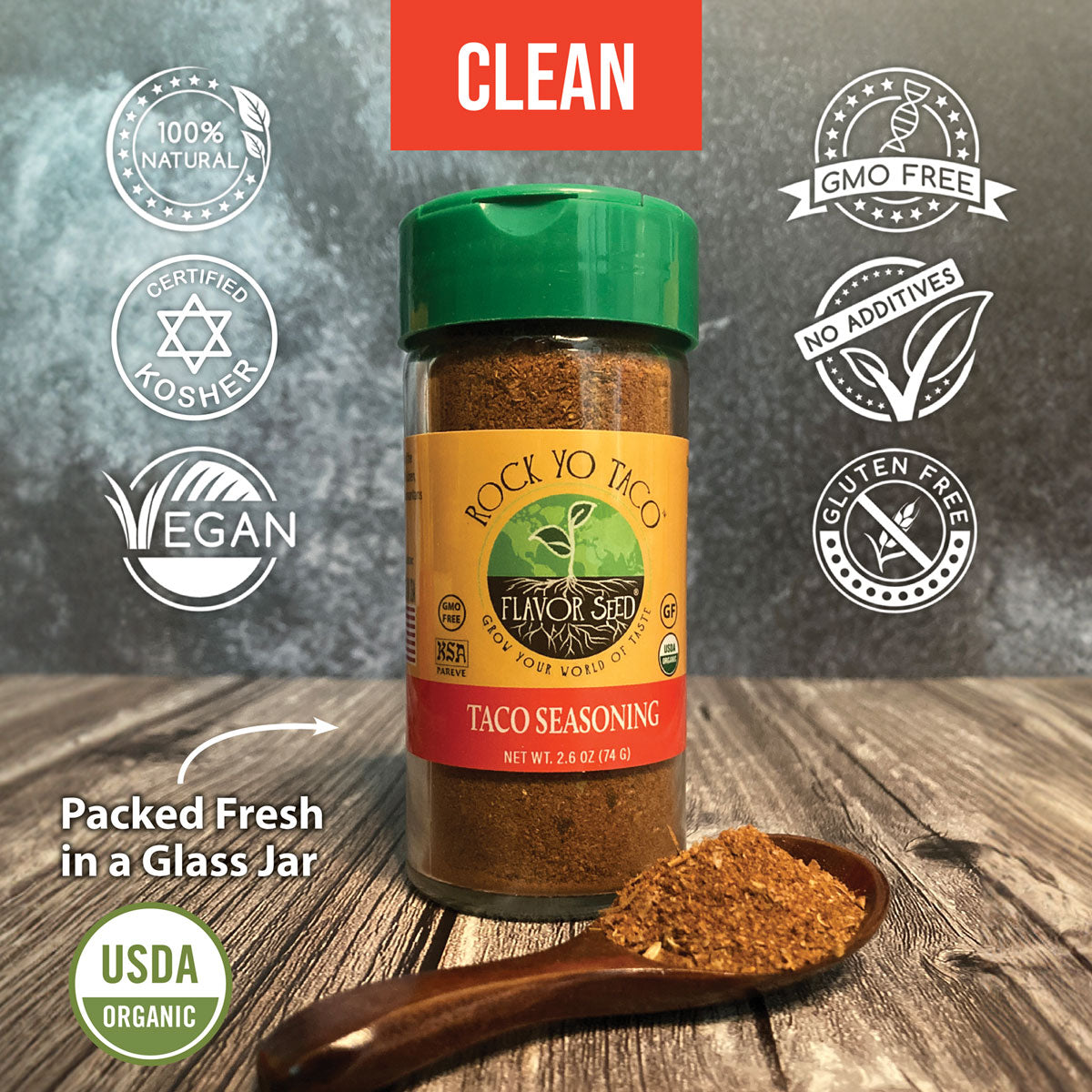 homemade taco seasoning in 2oz glass jar with spoon full of certified organic ingredients