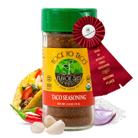 sugar free taco seasoning in 2oz glass jar with awards ribbon and key ingredients, front view