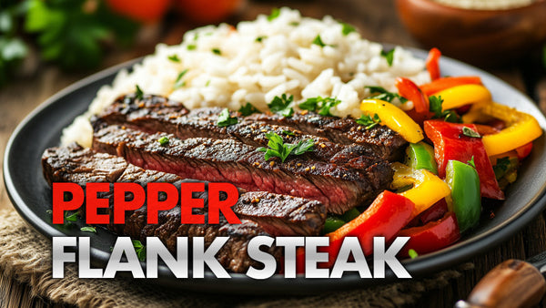 Grilled pepper flank steak sliced on a cutting board