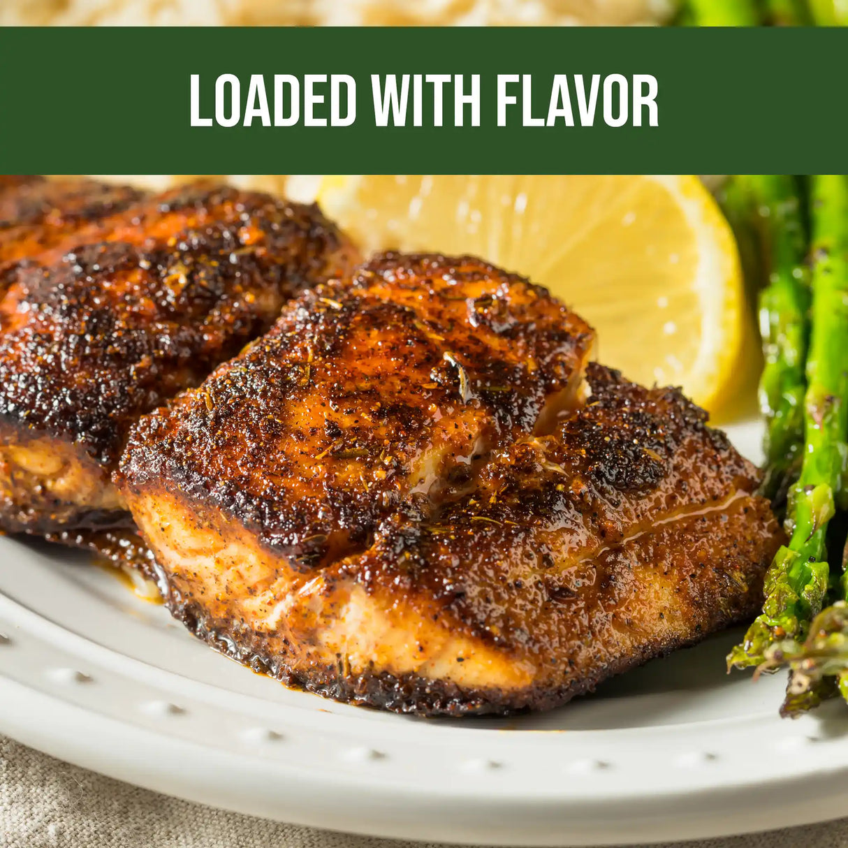 organic herb crusted grilled salmon filet with asparagus and lemon slices