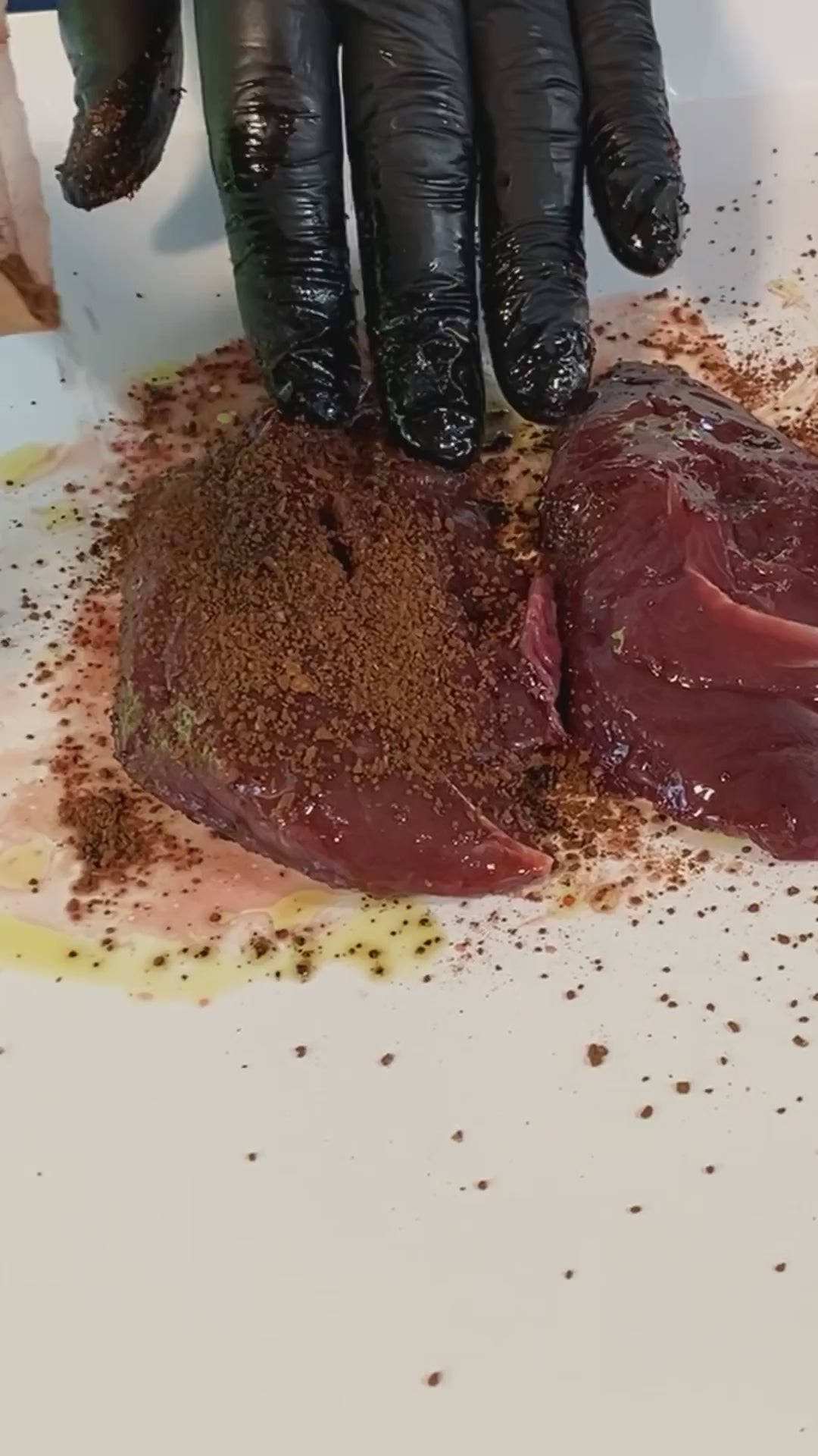 Cocoa Butt'Er organic chocolate coffee BBQ rub poured over steaks and pressed in (footage: AOQ)